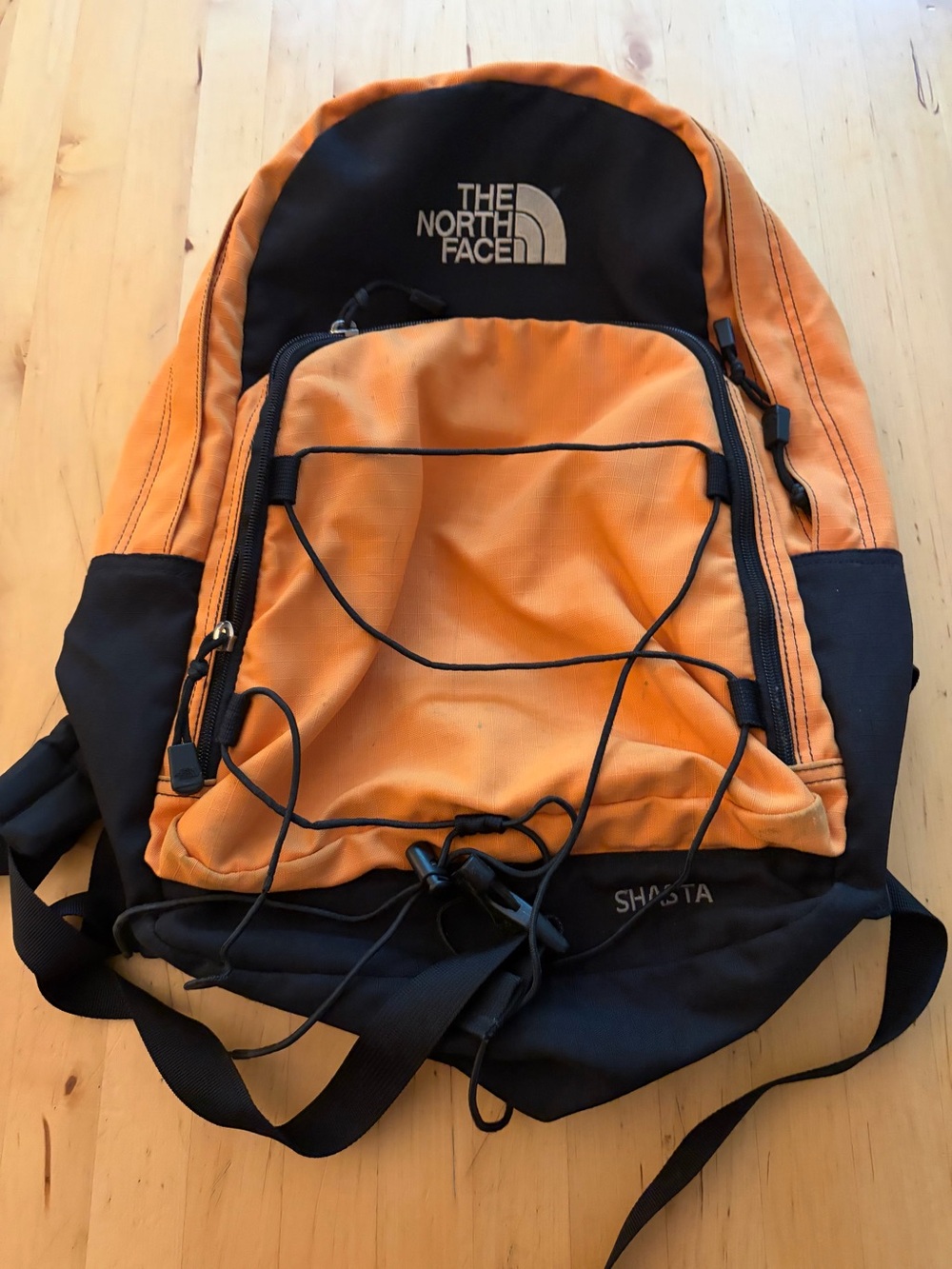The North Face Orange and Black Shasta Daypack